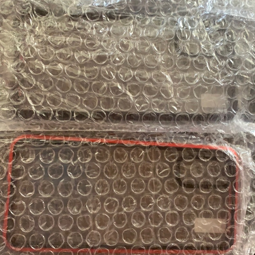 Brand new in package. Black and red or simple red